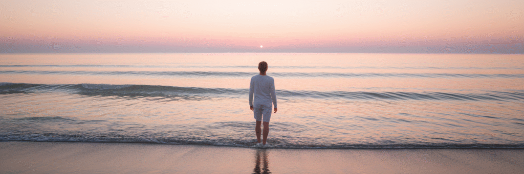Person at sunrise on Florida beach.