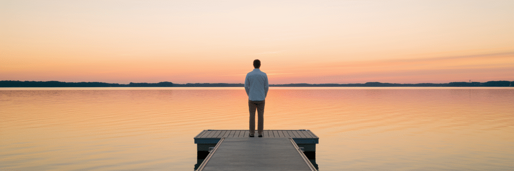 Person watching a hopeful sunrise in Maryland.