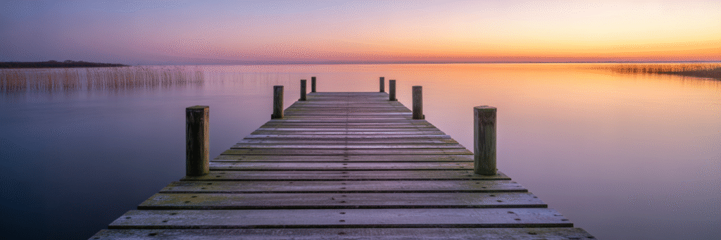 Hopeful sunrise over Chesapeake Bay dock.